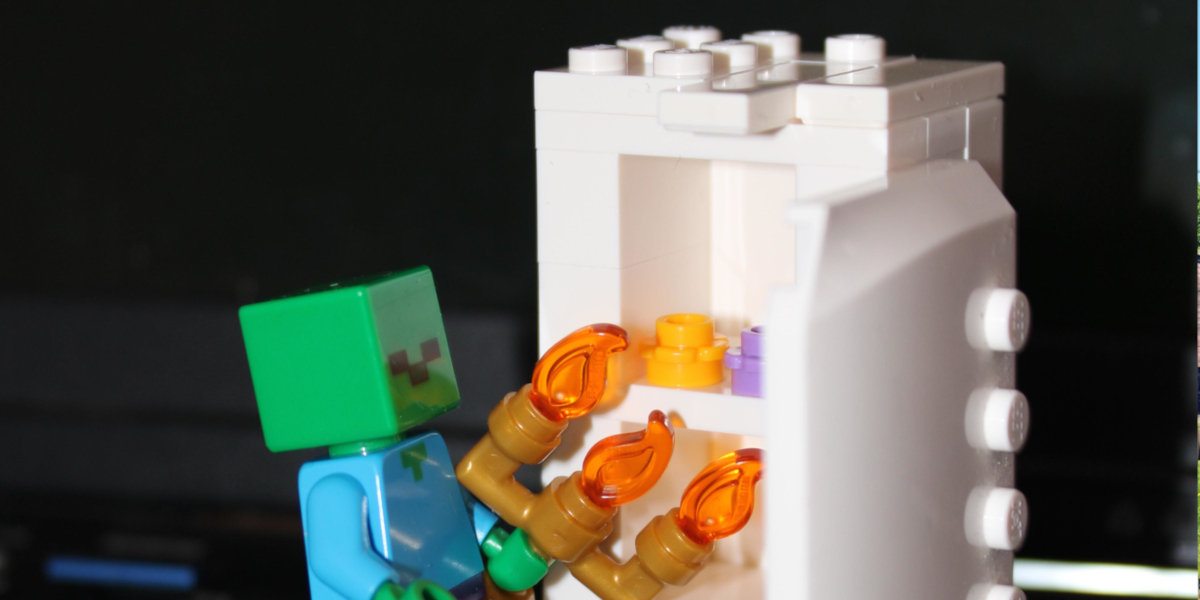 lego minifigure on keyboard